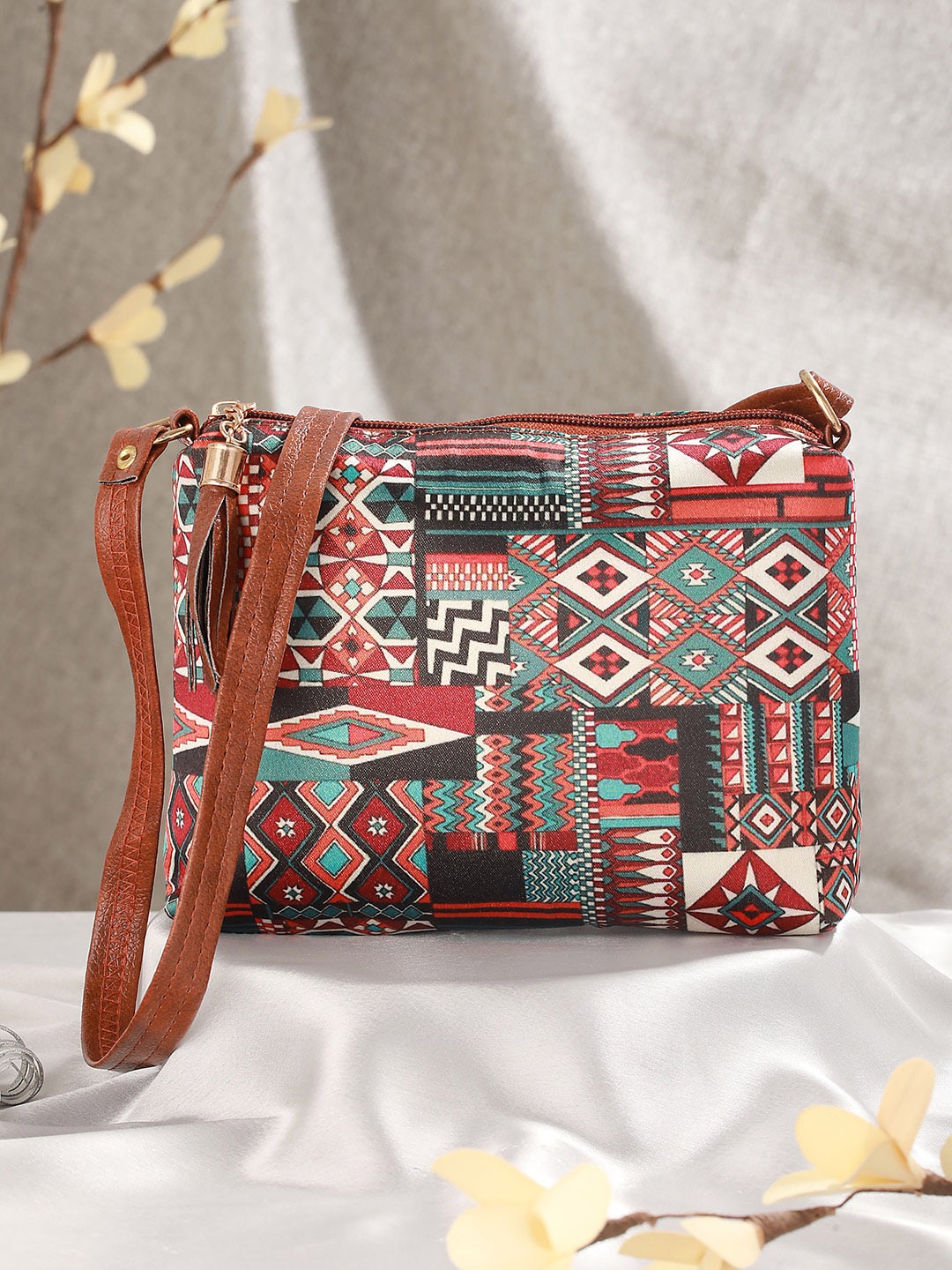 

Jazz and Sizzle Ethnic Motifs Printed Structured Sling Bag, Brown