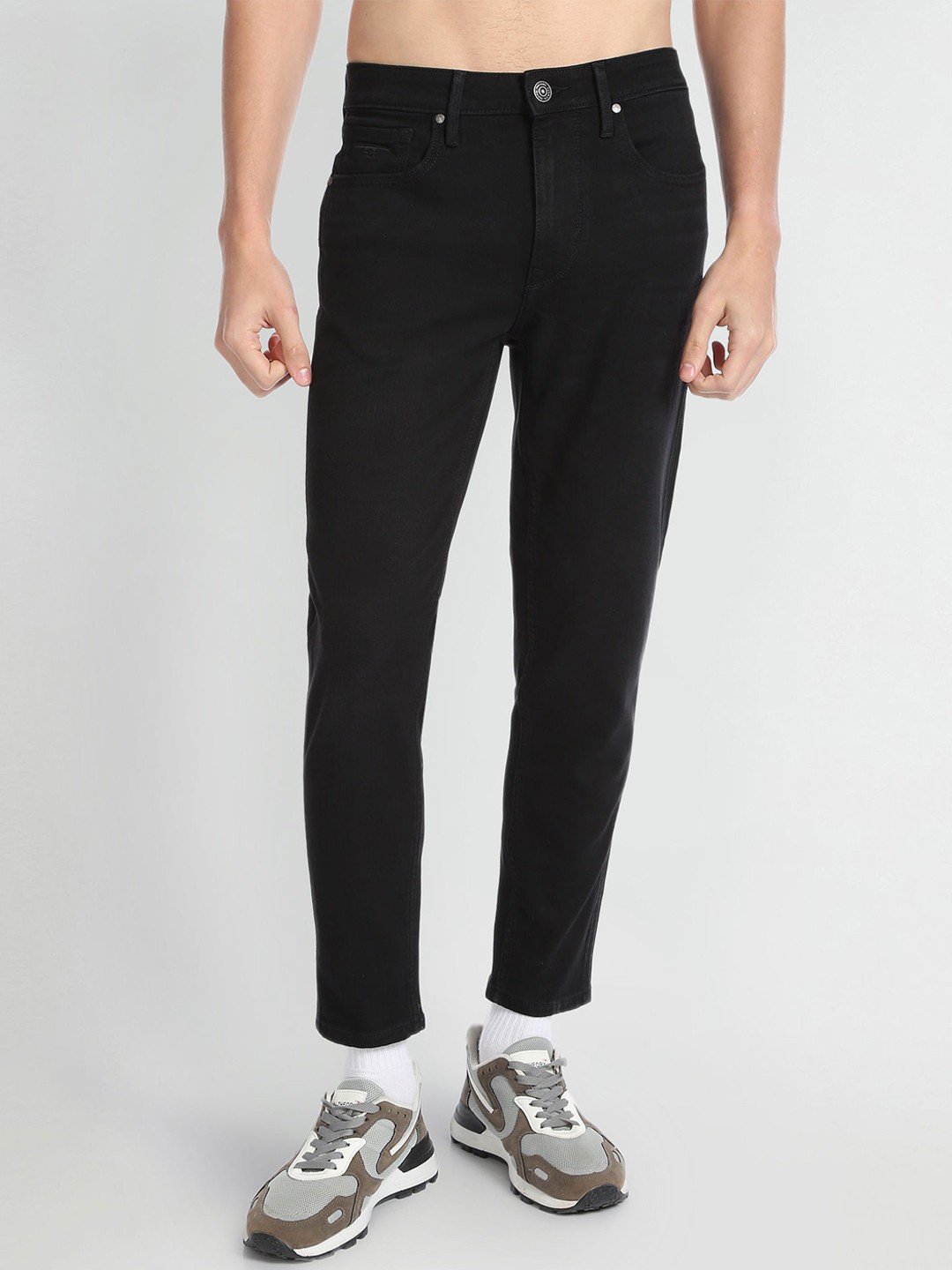 

Flying Machine Men Tapered Fit Mid-Rise Clean Look Cotton Stretchable Jeans, Black