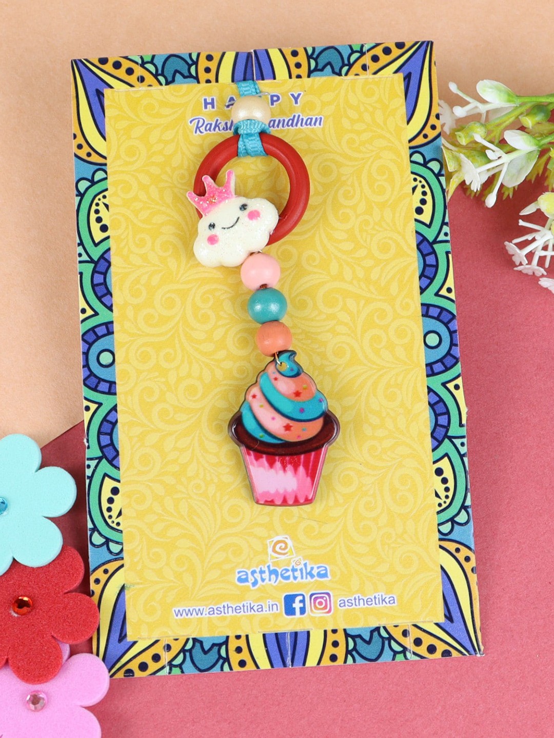 

Asthetika Girls Cupcake Charm Rakhi, Pink