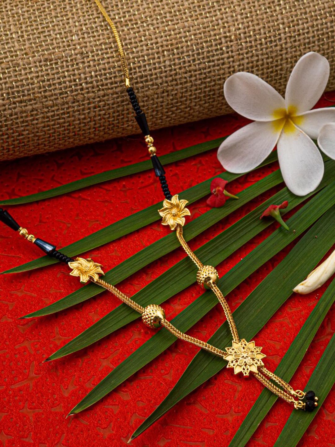 

Ramdev Art Fashion Jwellery Gold-Plated Flower Detail Mangalsutra