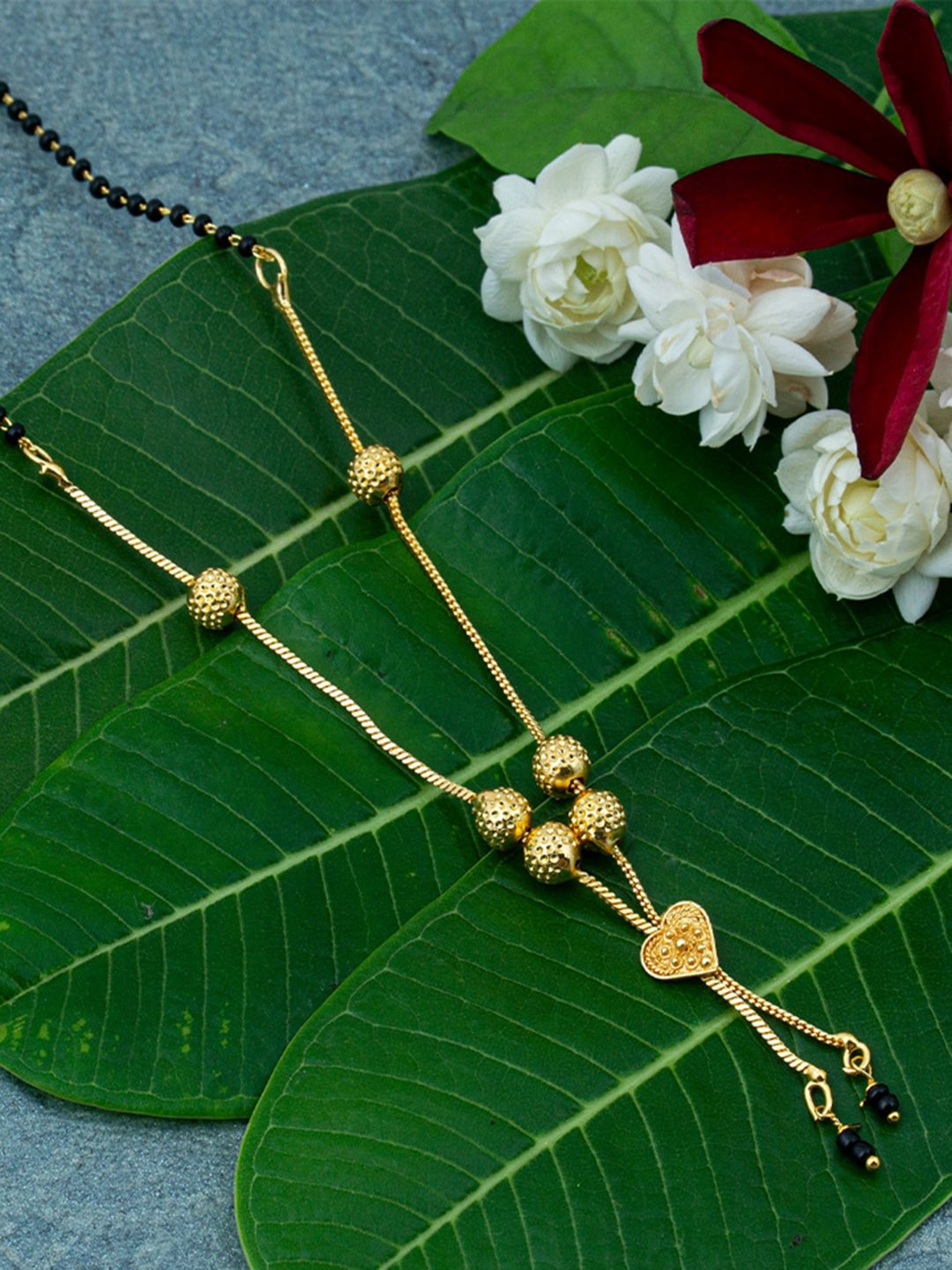 

Ramdev Art Fashion Jwellery Gold-Plated Stone Studded Beaded Mangalsutra