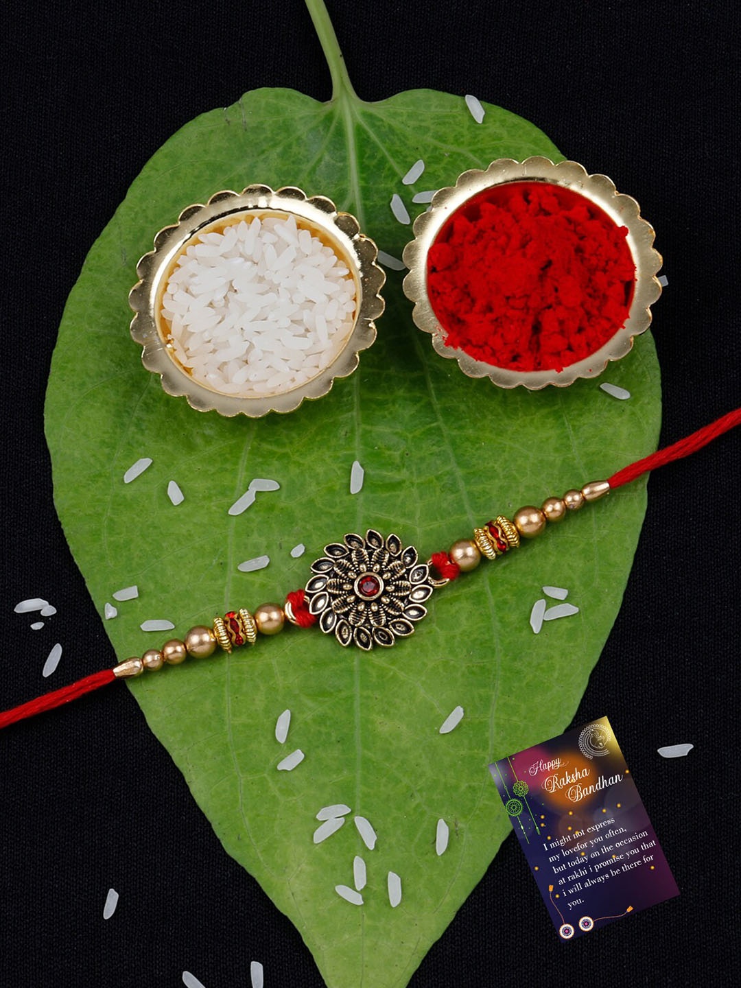 

Silver Shine Unisex Set Of 2 Dildar & Stone Flower Rakhi With Roli Chawal & Greeting Card, Red