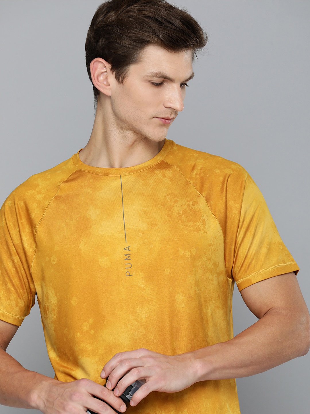 

Puma Studio Yogini Lite Training Logo Dyed dryCELL T-shirt, Yellow