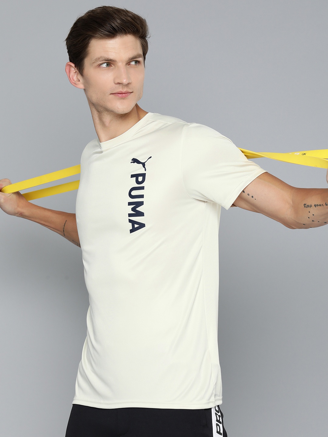 

Puma Brand Logo Printed dryCELL T-shirt, Beige