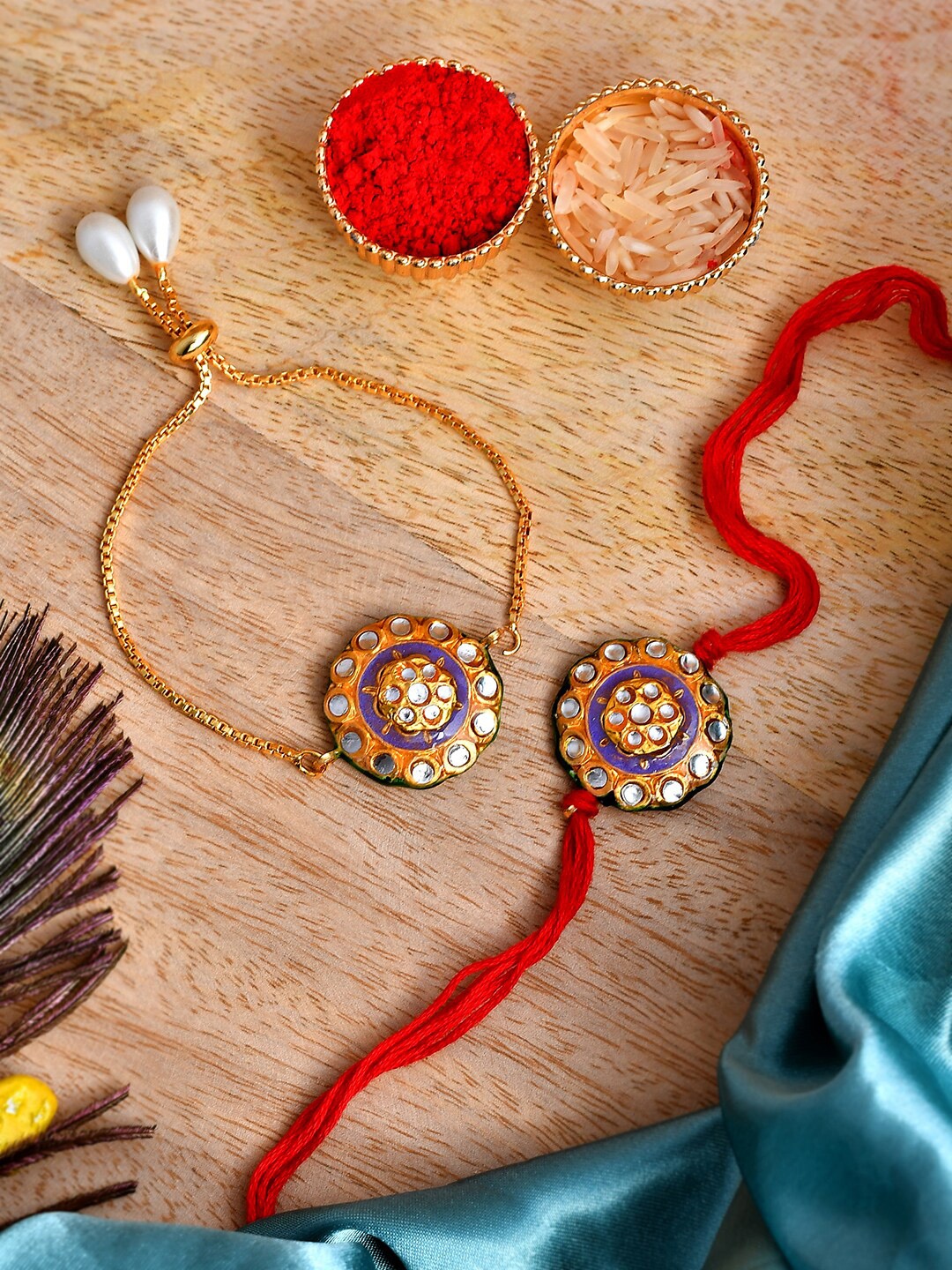 

Shoshaa Red & Gold Meenakari Kundan Lumba Bracelete Rakhi with Roli Chawal