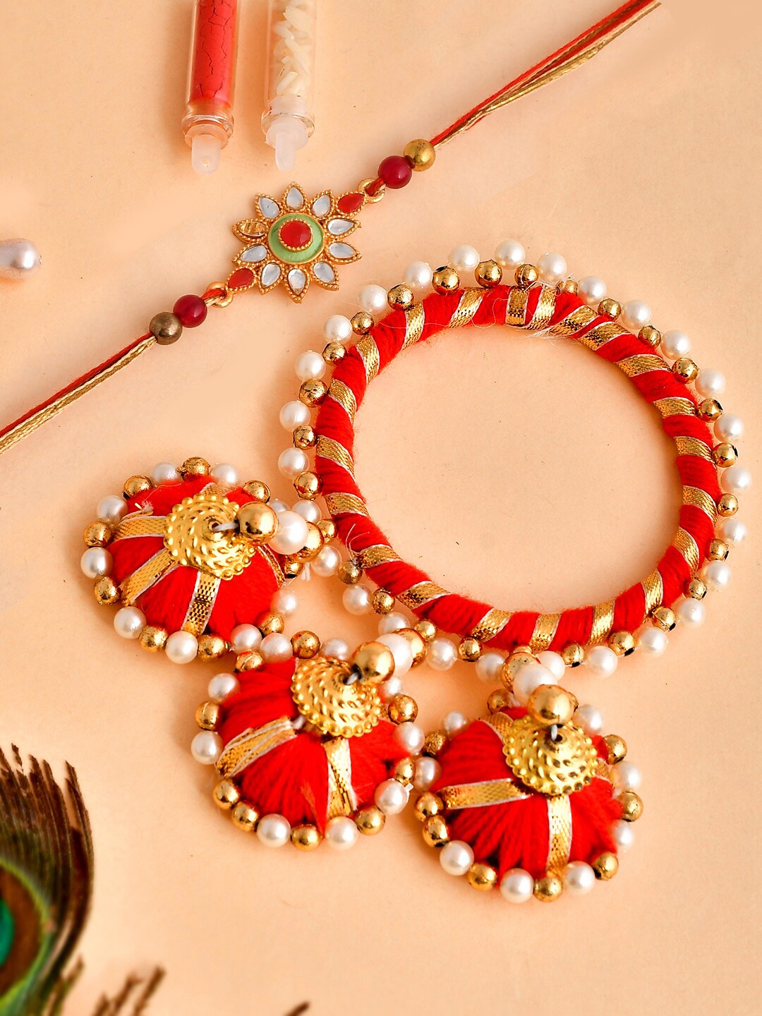 

Shoshaa Kundan Mirror Bhai Rakhi & Red Lumba Bangle Bhai Bhabhi Rakhi