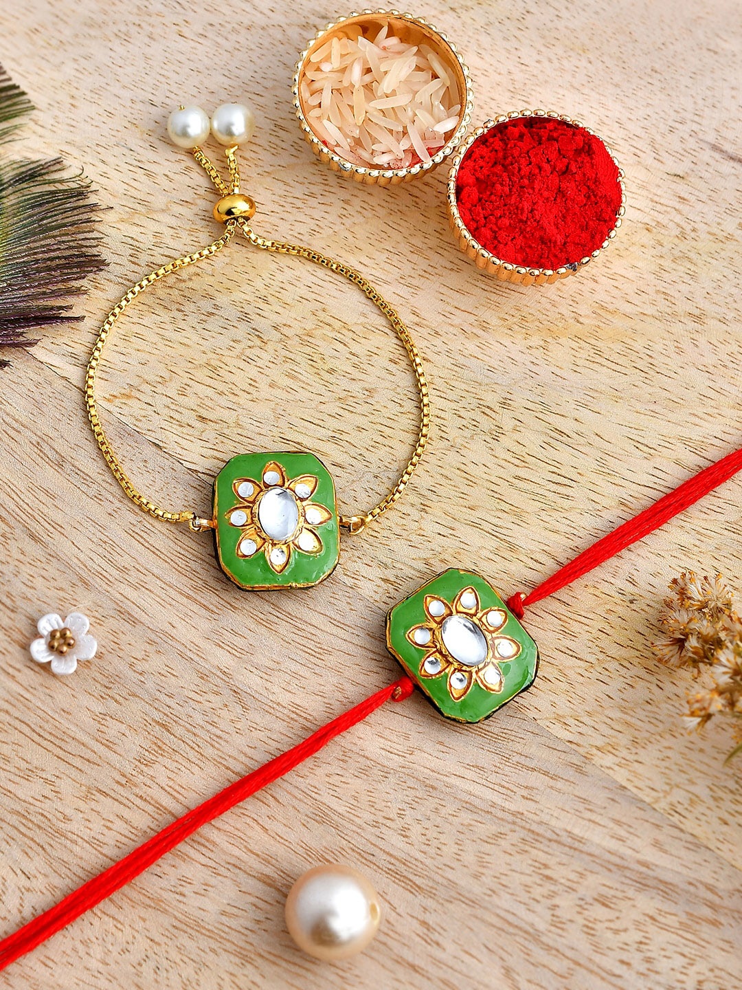

Shoshaa Green & Red Thread Kundan Meenakari Lumba Bracelete Rakhi with Roli Chawal