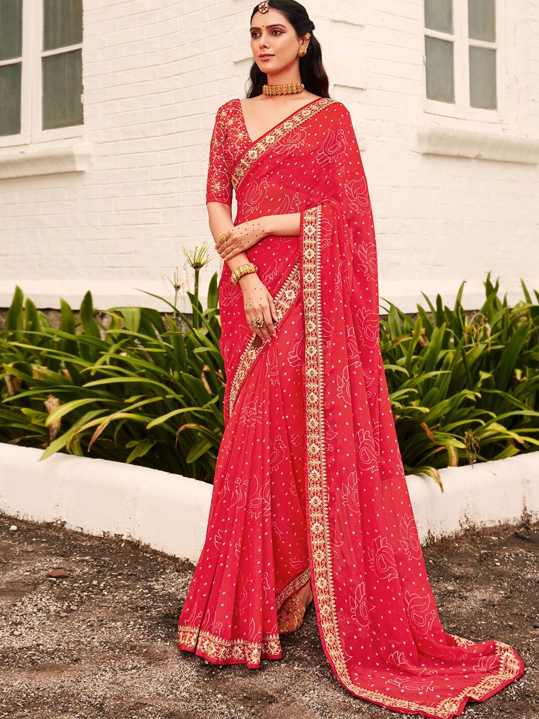 

Mitera Pink & White Bandhani Printed Embroidered Saree