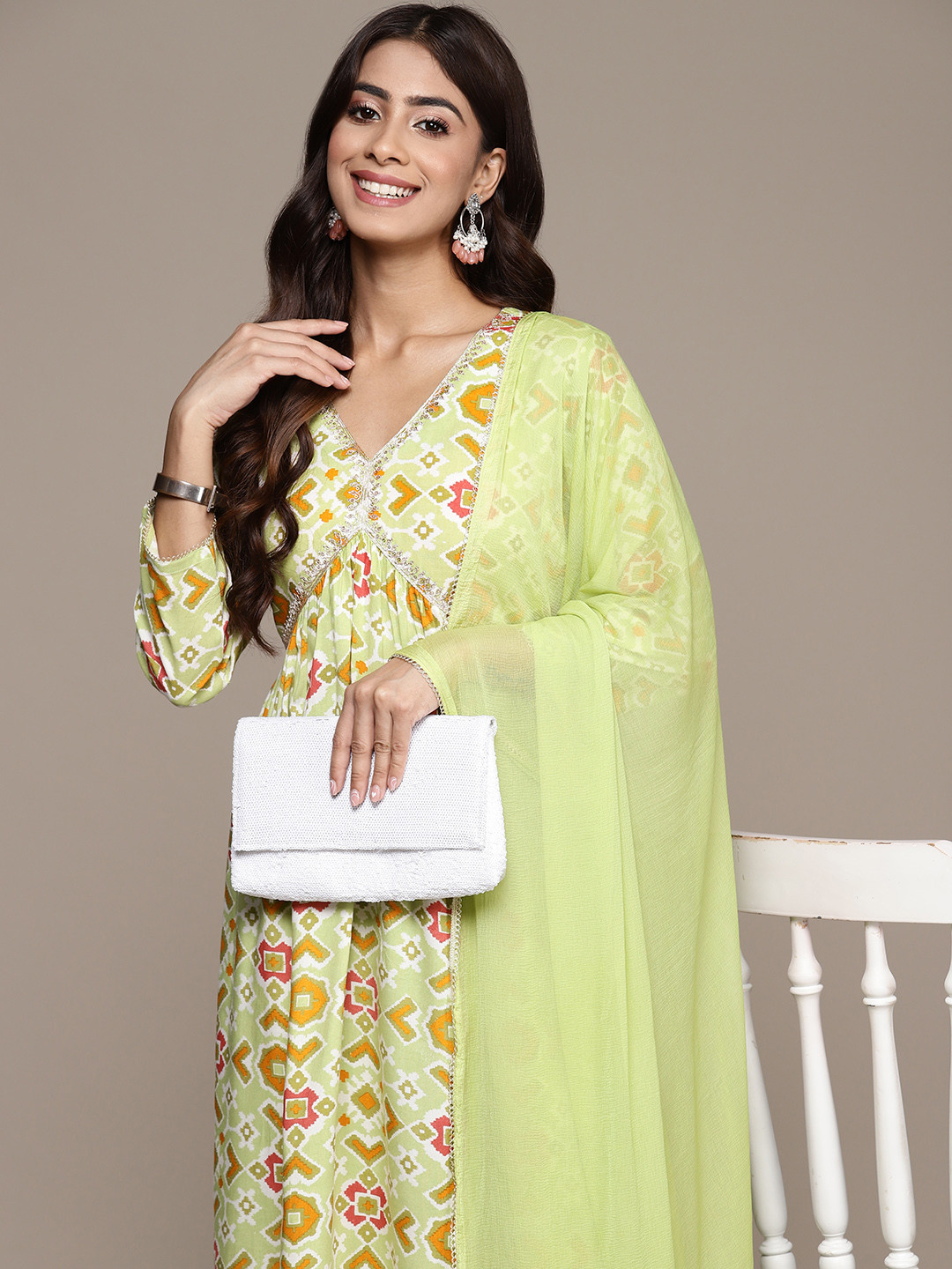 

Ishin Women Ethnic Motifs Printed Regular Thread Work Kurta with Trousers & With Dupatta, Green