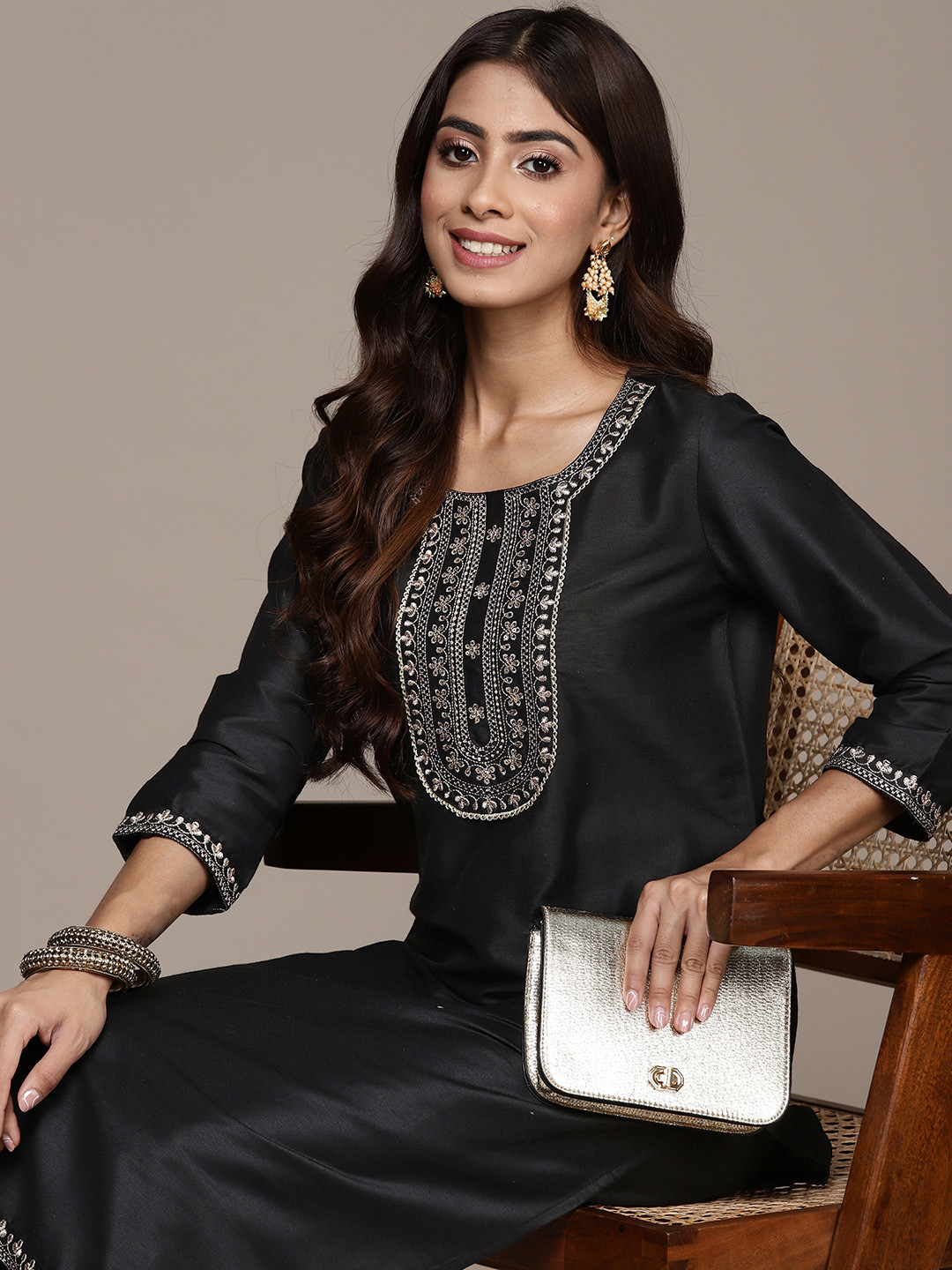 

Ishin Women Ethnic Motifs Embroidered Regular Thread Work Kurta with Trousers, Black