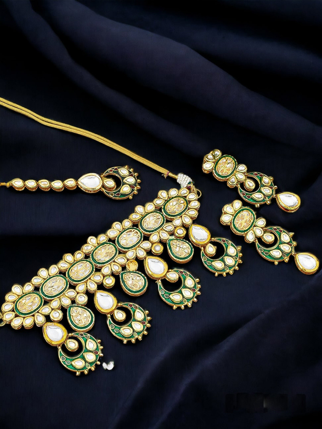 

Silvermerc Designs Gold Plated Kundan Stone Studded Jewellery Set