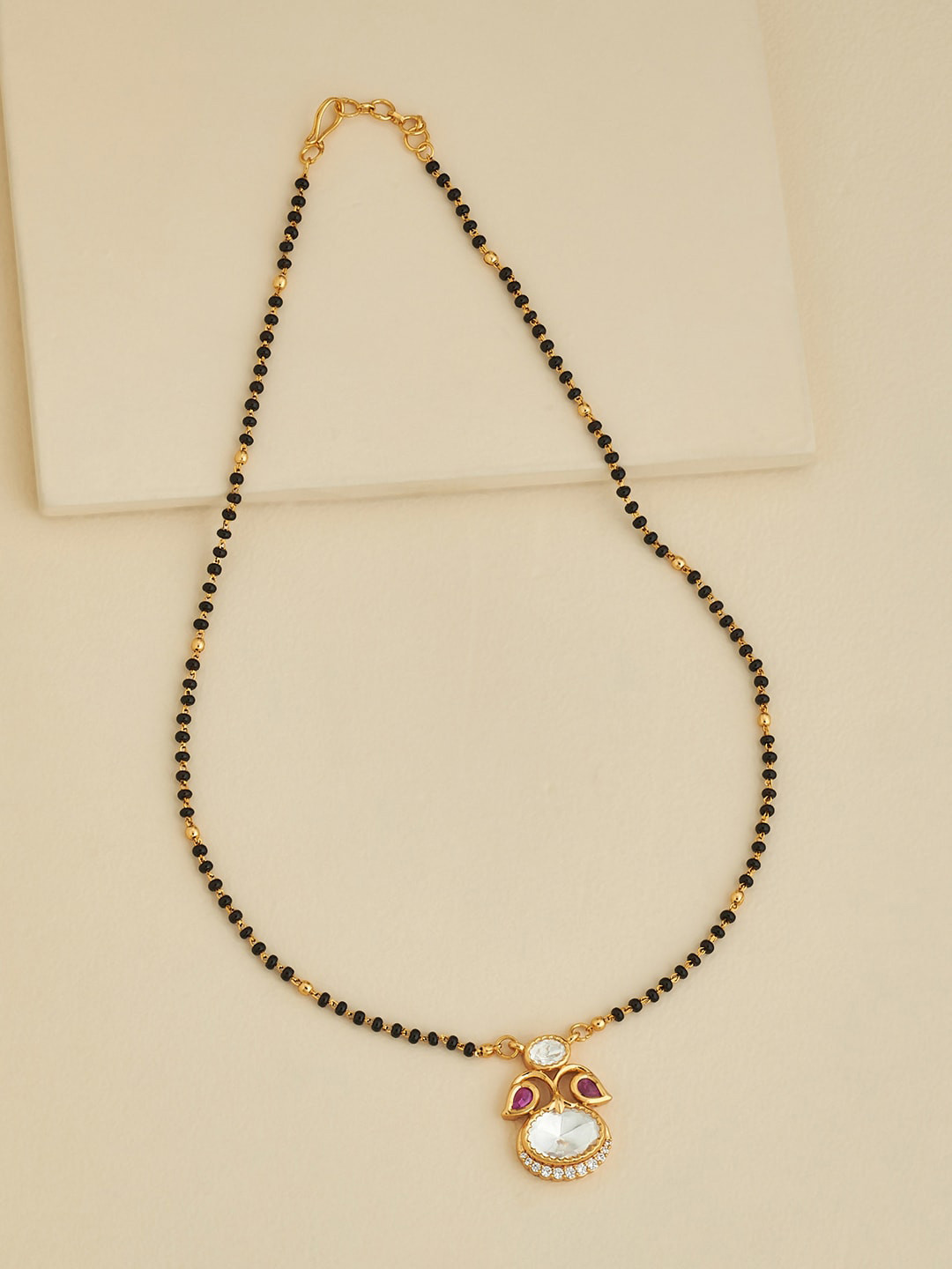 

Kushal's Fashion Jewellery Stone Studded & Beaded Mangalsutra, Gold