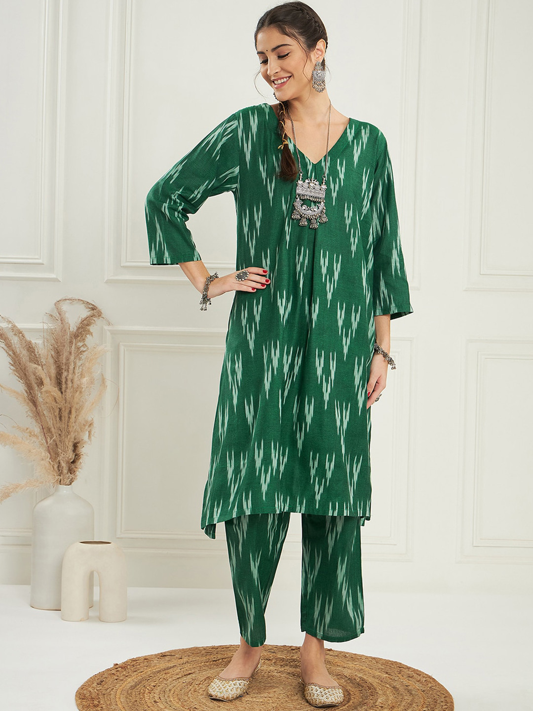 

InWeave Green & White Ikat Printed V-Neck Pure Cotton A-Line Kurta With Palazzos