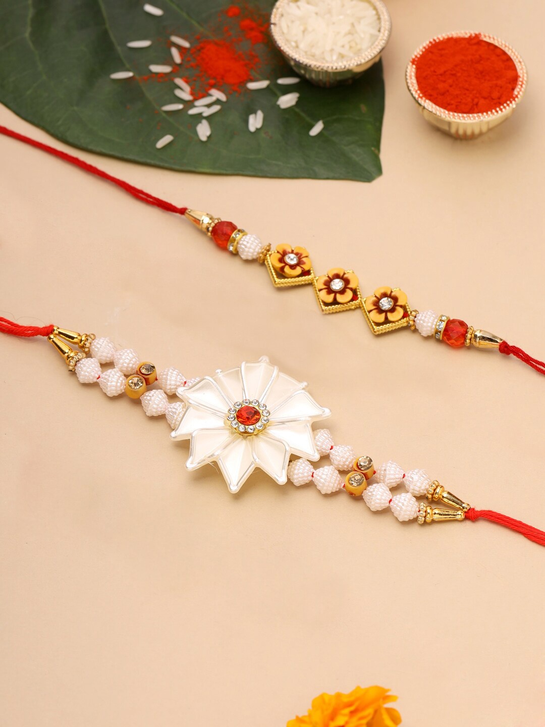 

Natures Buggy Set Of 2 Gold-Plated Beaded Rakhi, Red