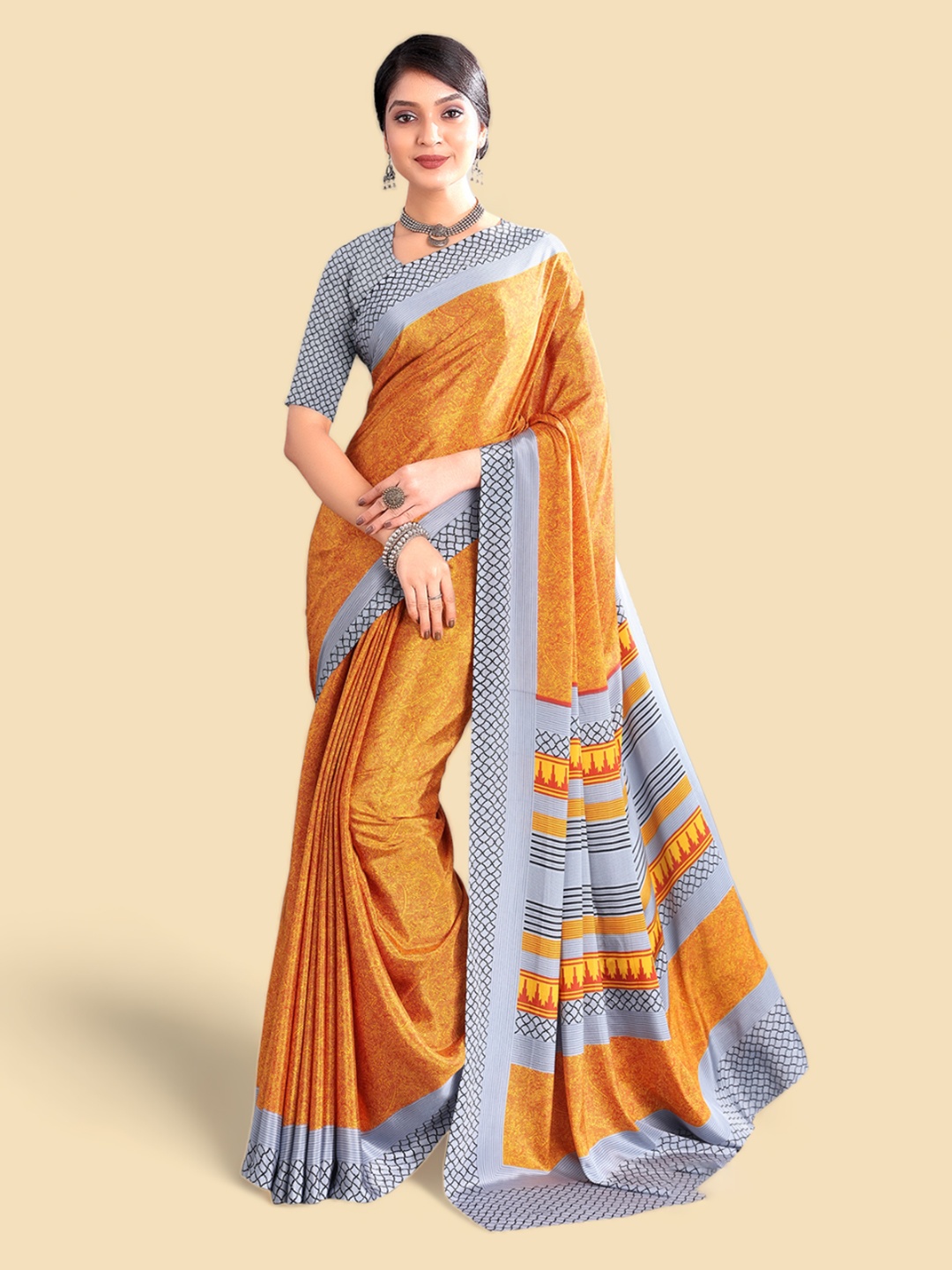 

Kasak Yellow & Grey Ethnic Motifs Printed Poly Crepe Saree