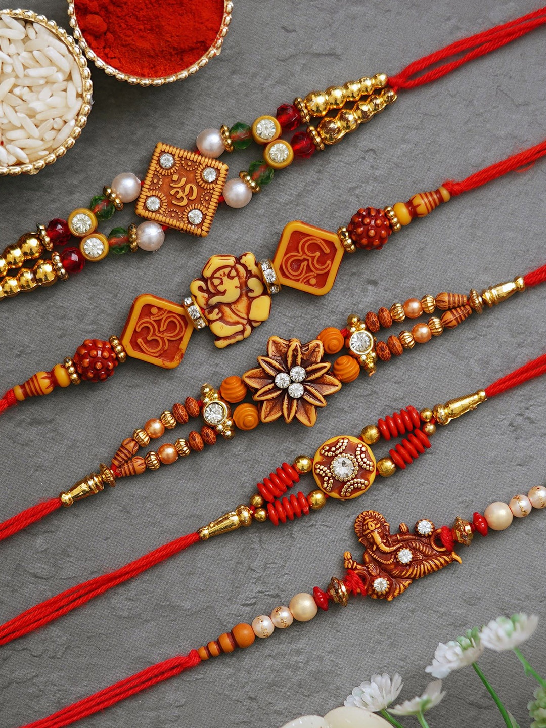 

Fashion Bizz Unisex Set of 5 Stone-Studded & Charm Beaded Rakhis With Roli & Chawal, Red