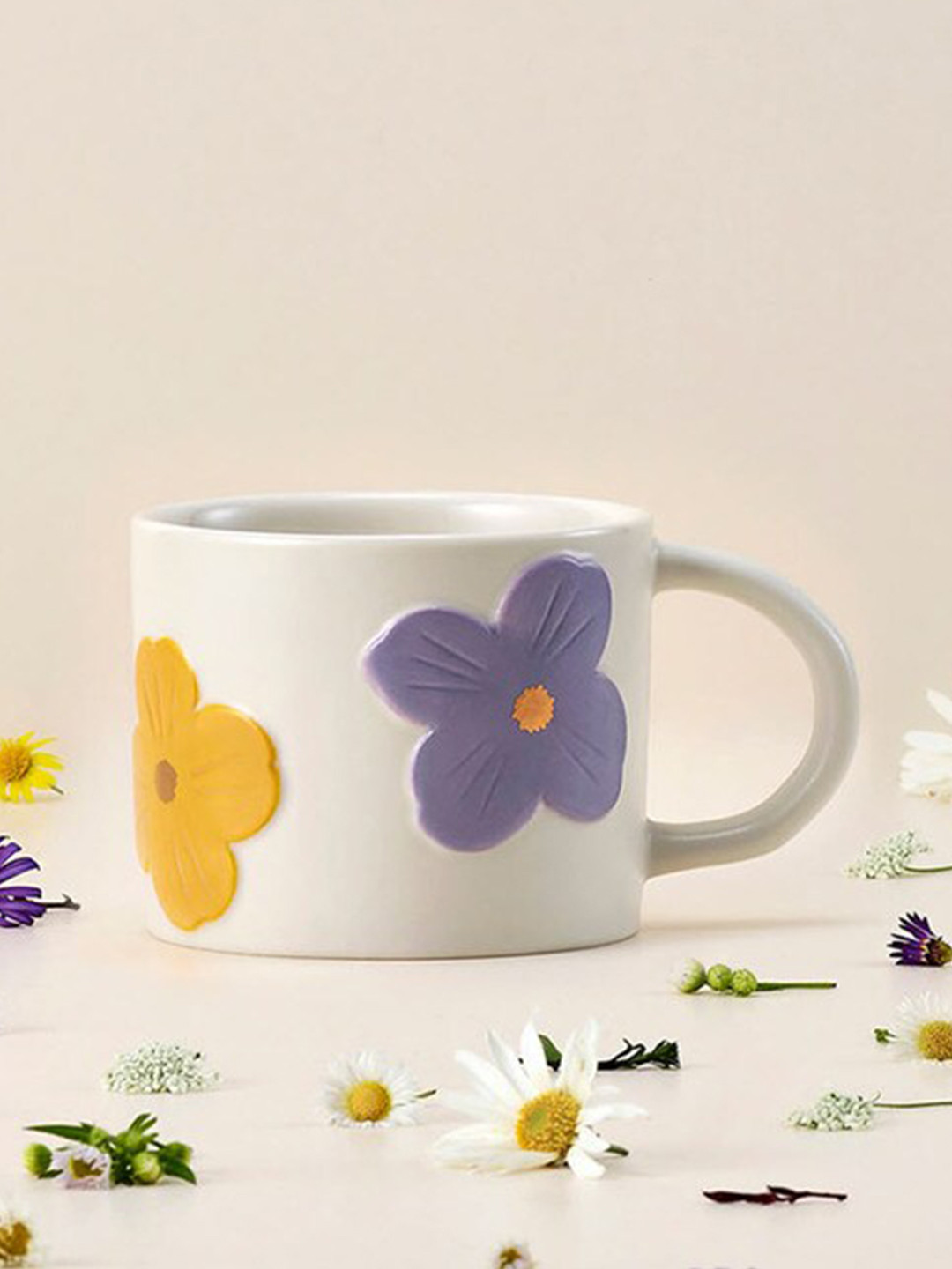 

Starbucks White & Yellow Floral Embossed Ceramic Glossy Mug - 296 ML