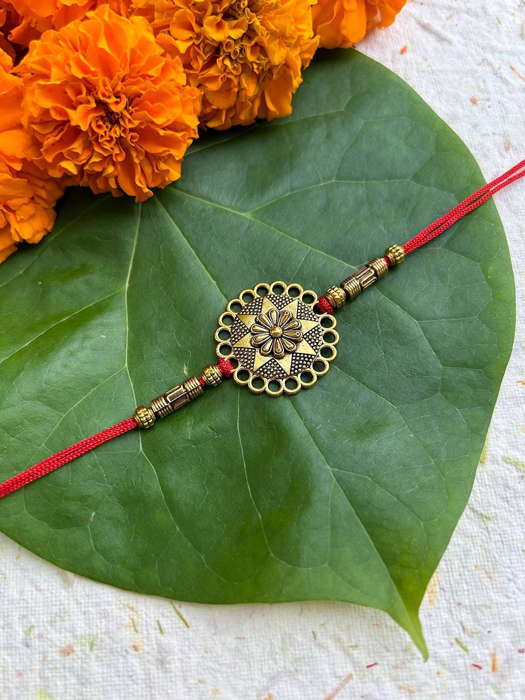 

FIROZA Men Poppy Sacred Rakhi, Gold