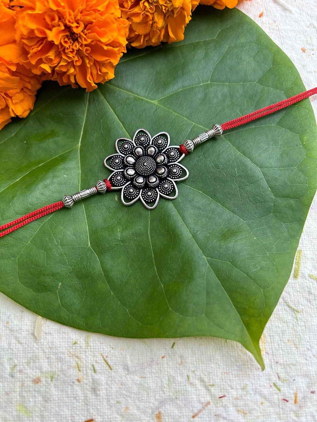 

FIROZA Pankhudi Sacred Rakhi, Silver