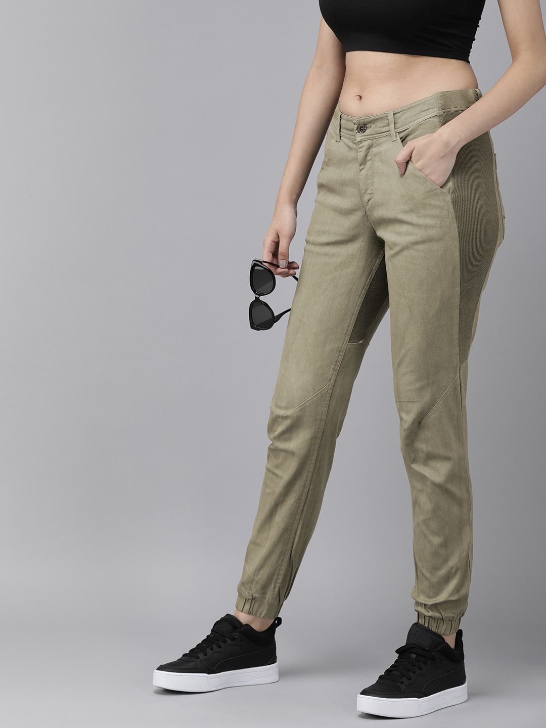 

The Roadster Life Co. Women Solid With Ribbed Tape Detail Joggers, Green