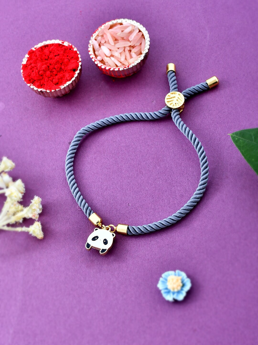 

Aapno Rajasthan Panda Charm Beaded Rakhi, Blue