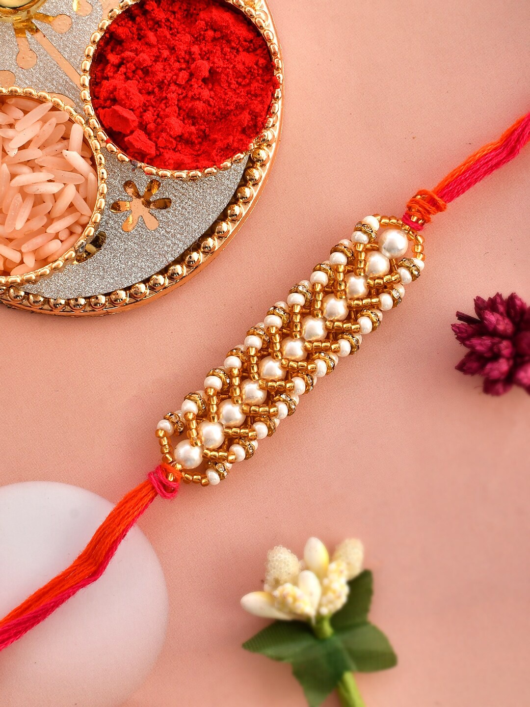 

Aapno Rajasthan Beaded Thread Rakhi With Roli Chawal & Greeting Card, Gold