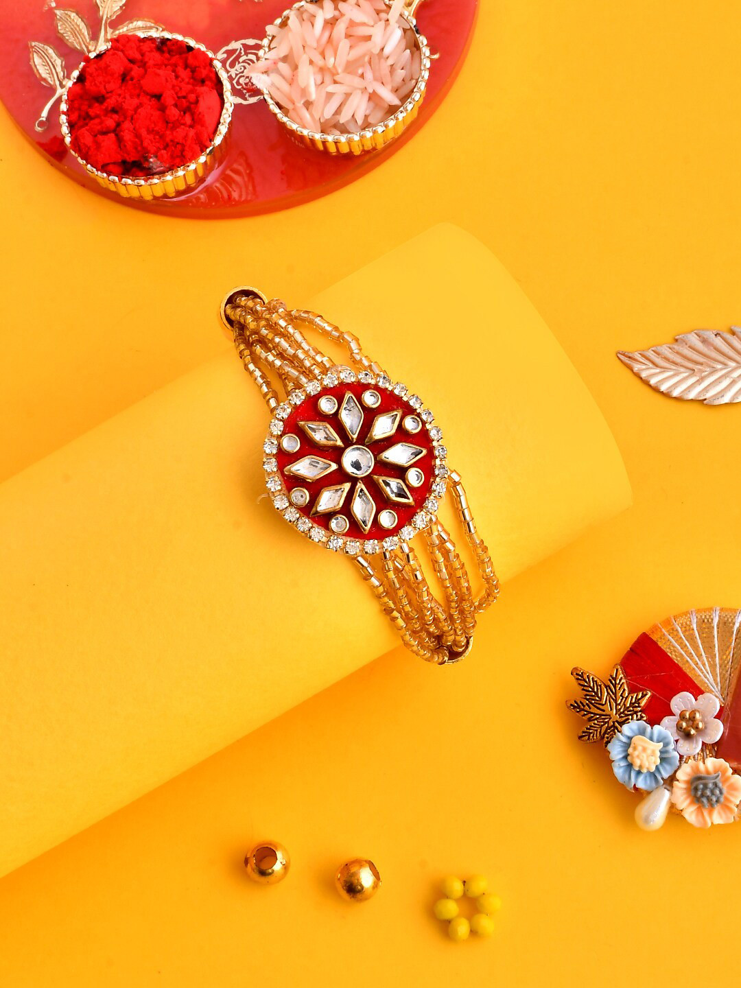 

Aapno Rajasthan Floral Kundan & Beaded Bracelet Rakhi, Gold
