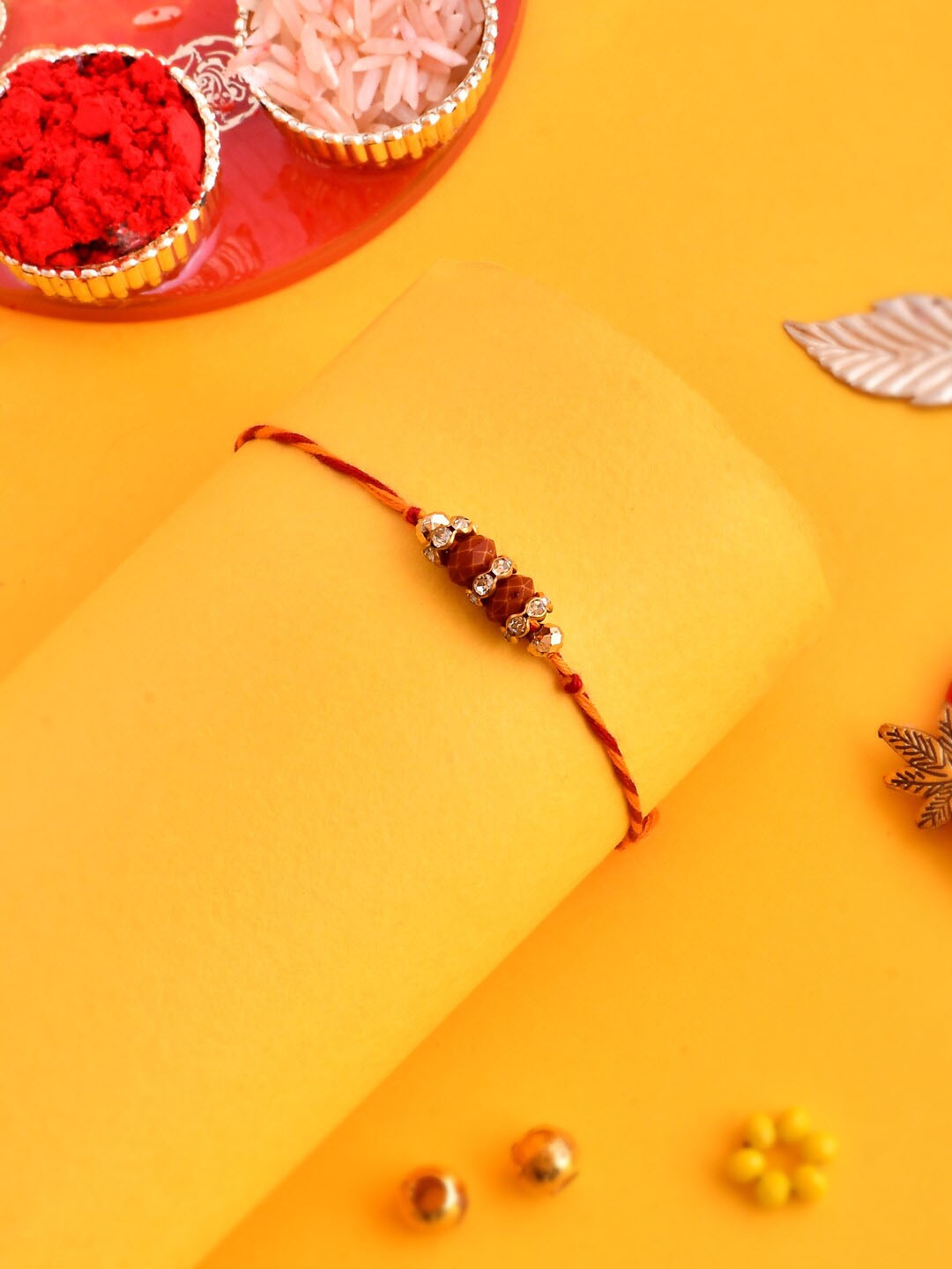

Aapno Rajasthan Crystal-Studded & Beaded Rakhi, Red