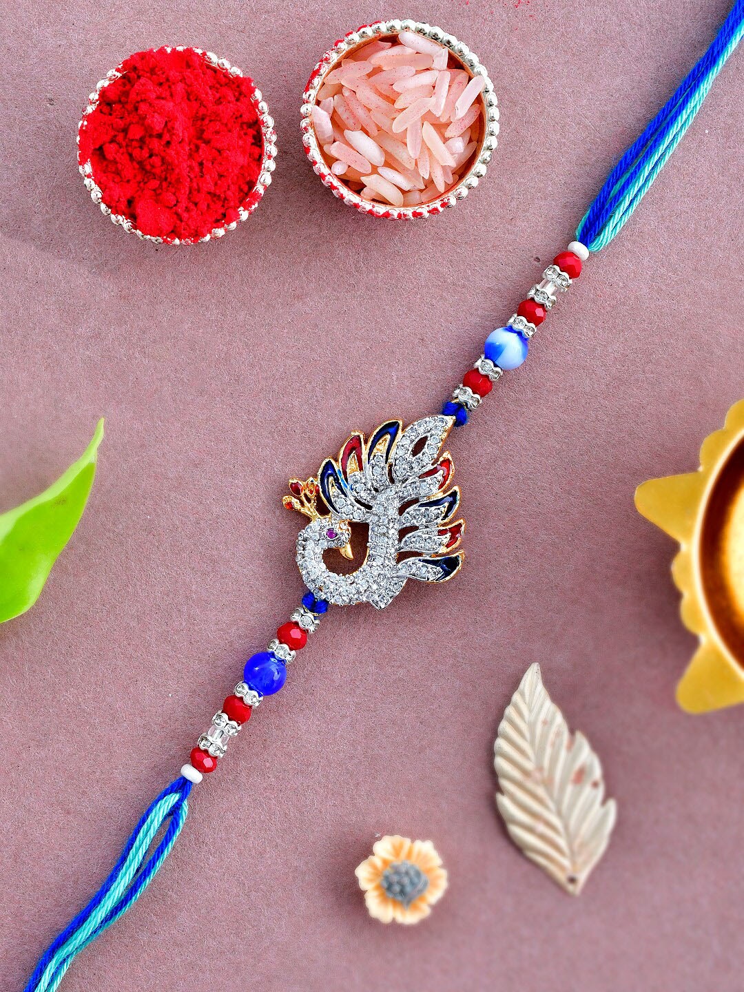 

Aapno Rajasthan Peacock Patterned Rakhi, Blue