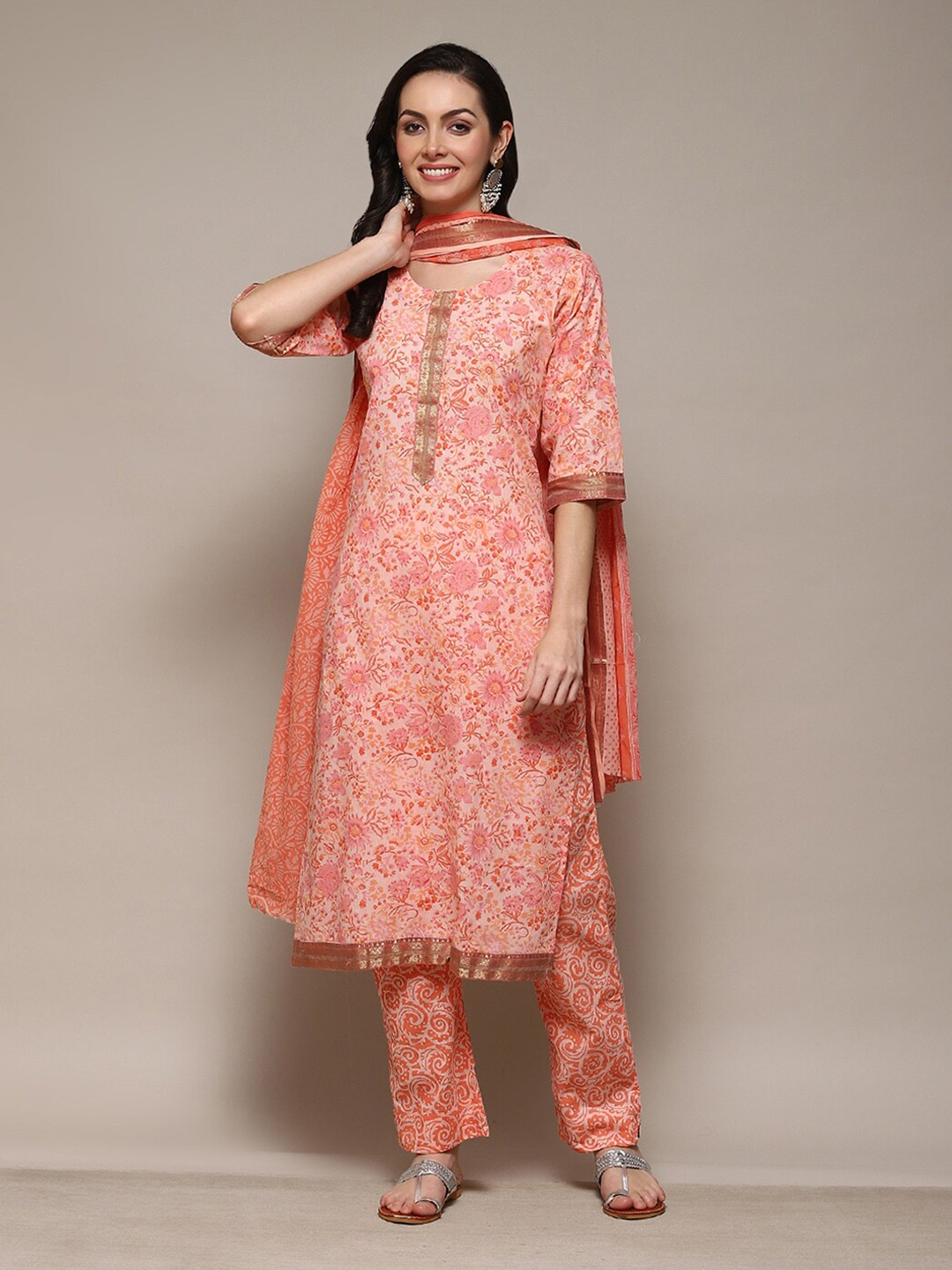 

Biba Floral Printed Zari Unstitched Dress Material, Peach