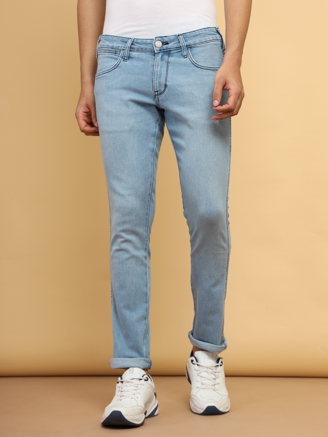 

Wrangler Men Skanders Clean Look Slim Fit Low-Rise Cotton Stretchable Jeans, Blue