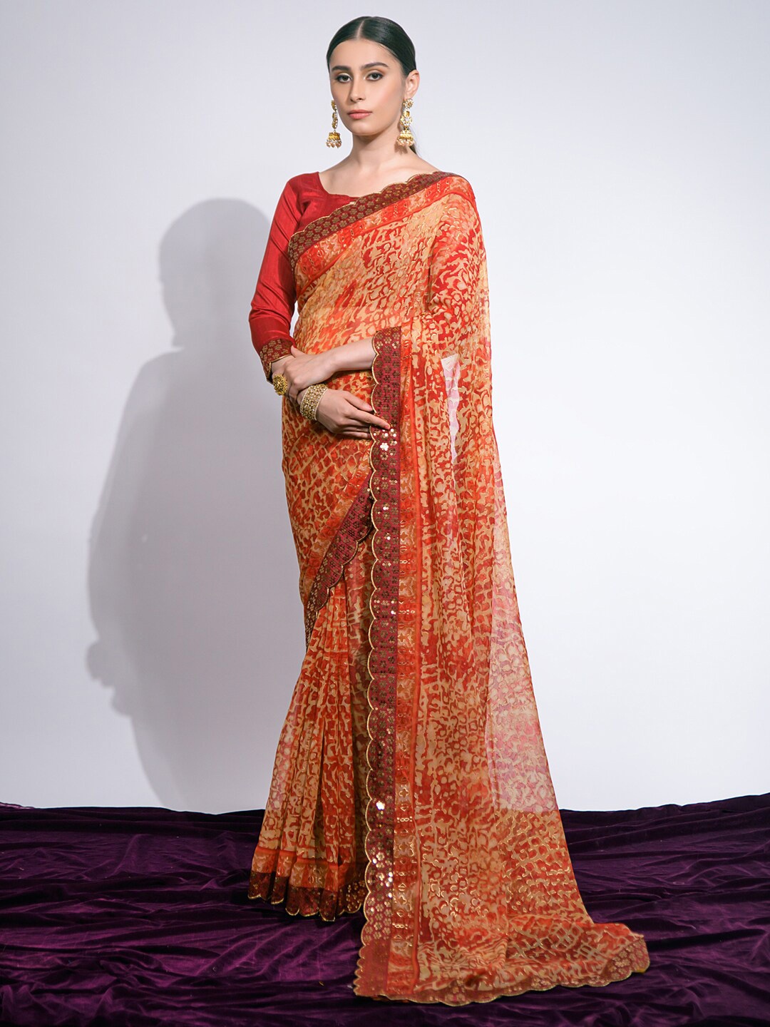

Mitera Cream-Coloured & Red Abstract Printed Sequinned Poly Chiffon Saree