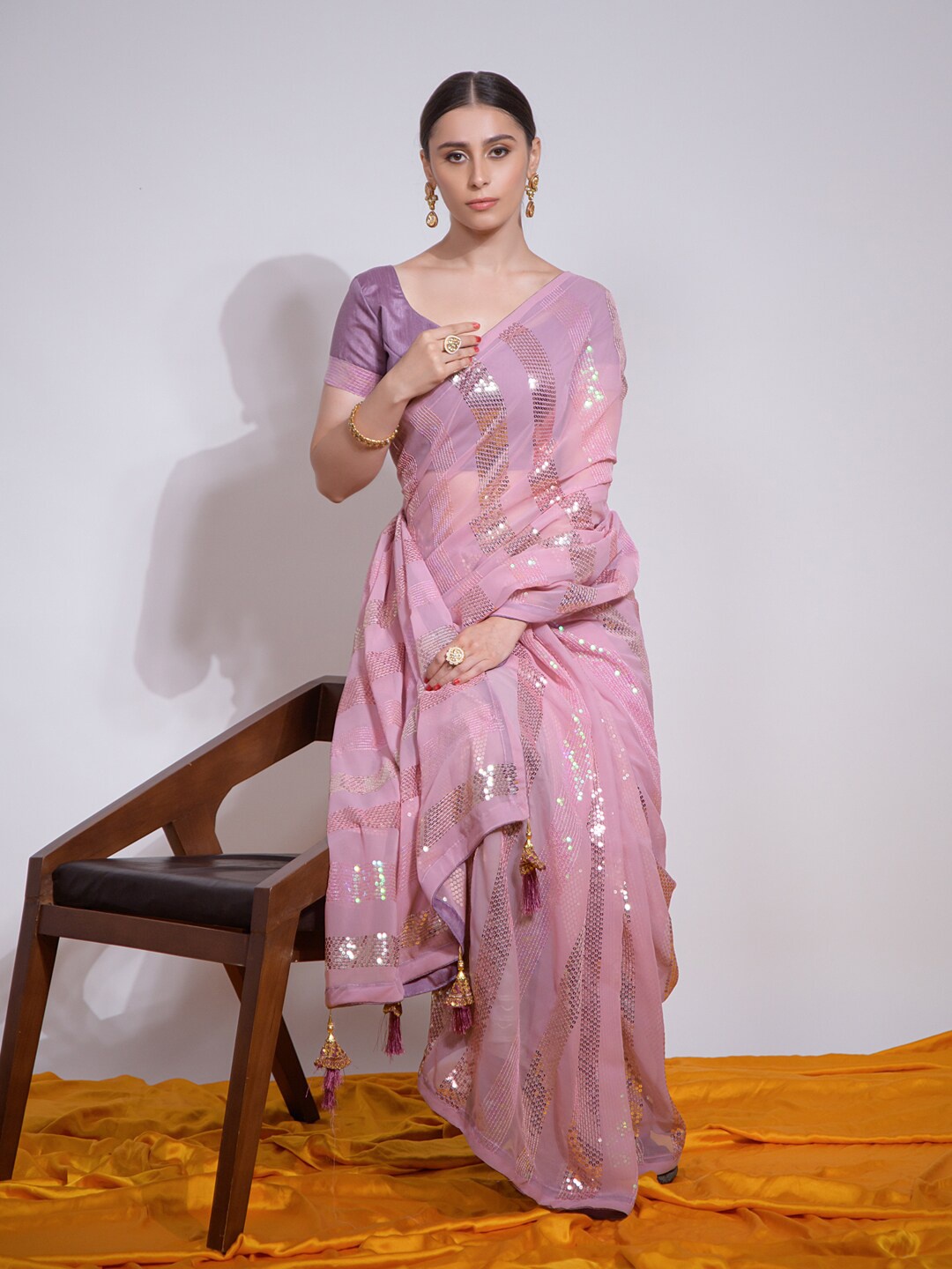 

Mitera Mauve Embellished Sequinned Poly Georgette Saree