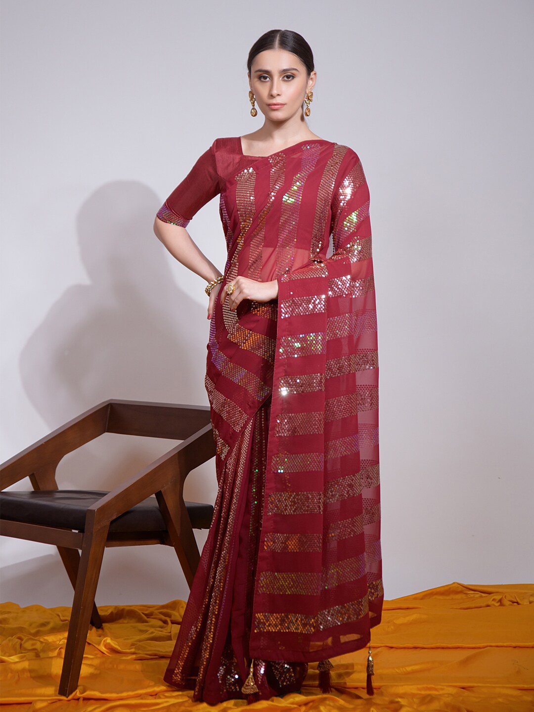 

Mitera Maroon Embellished Sequinned Pure Georgette Saree