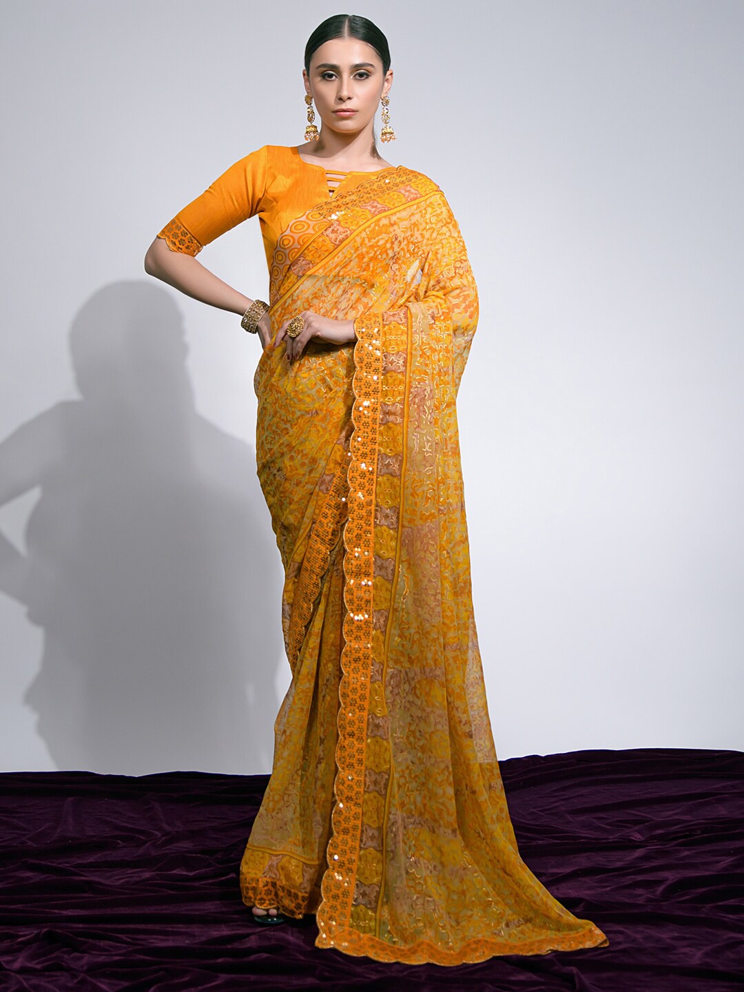 

Mitera Yellow & Gold-Toned Abstract Printed Sequinned Pure Chiffon Saree