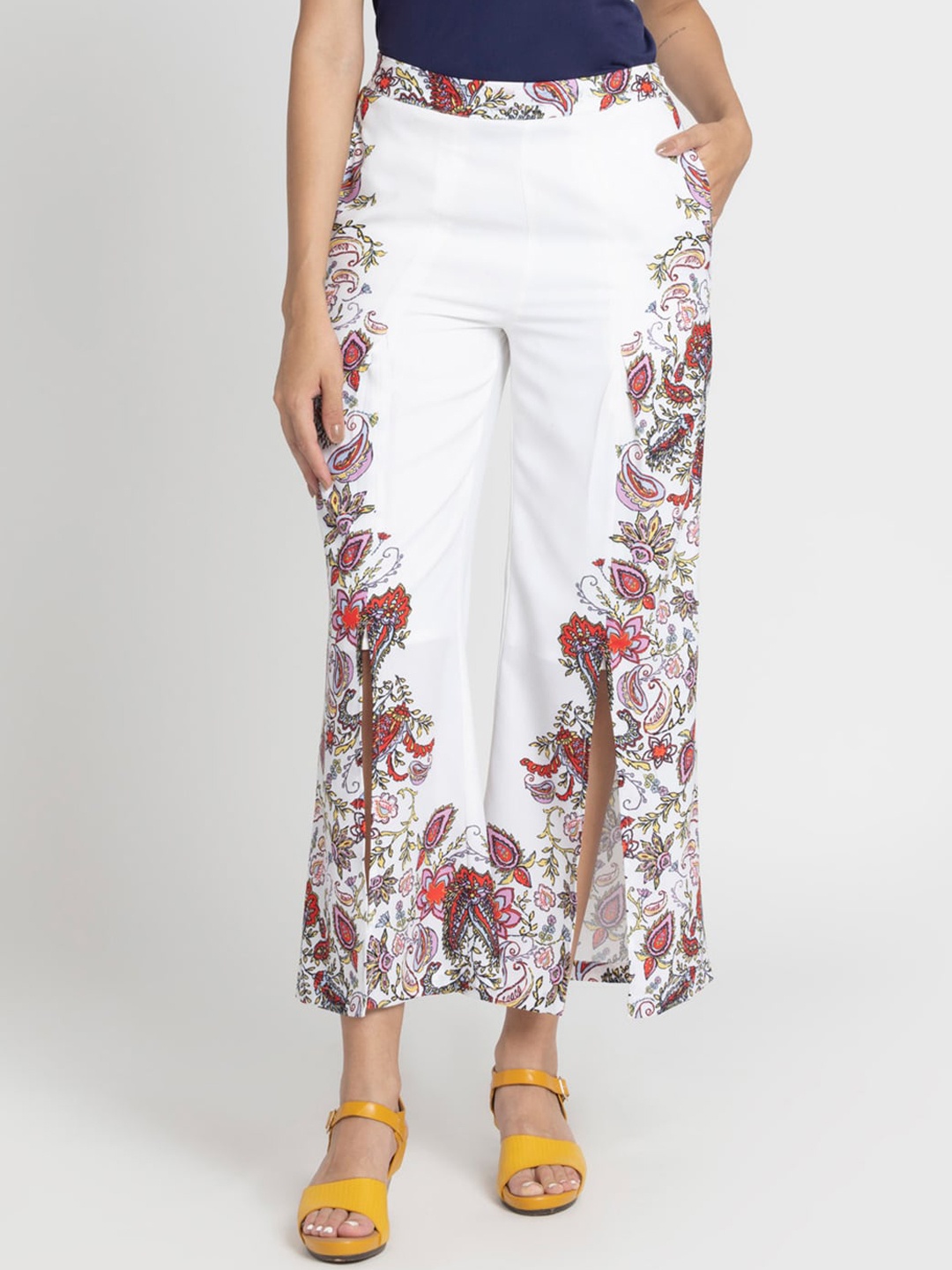 

SHAYE Women Smart Mid Rise Ethnic Motifs Printed Front Slits Trousers, White