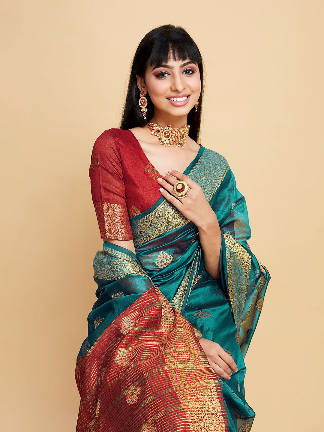

Sangria Sea Green Ethnic Motif Woven Design Zari Organza Saree
