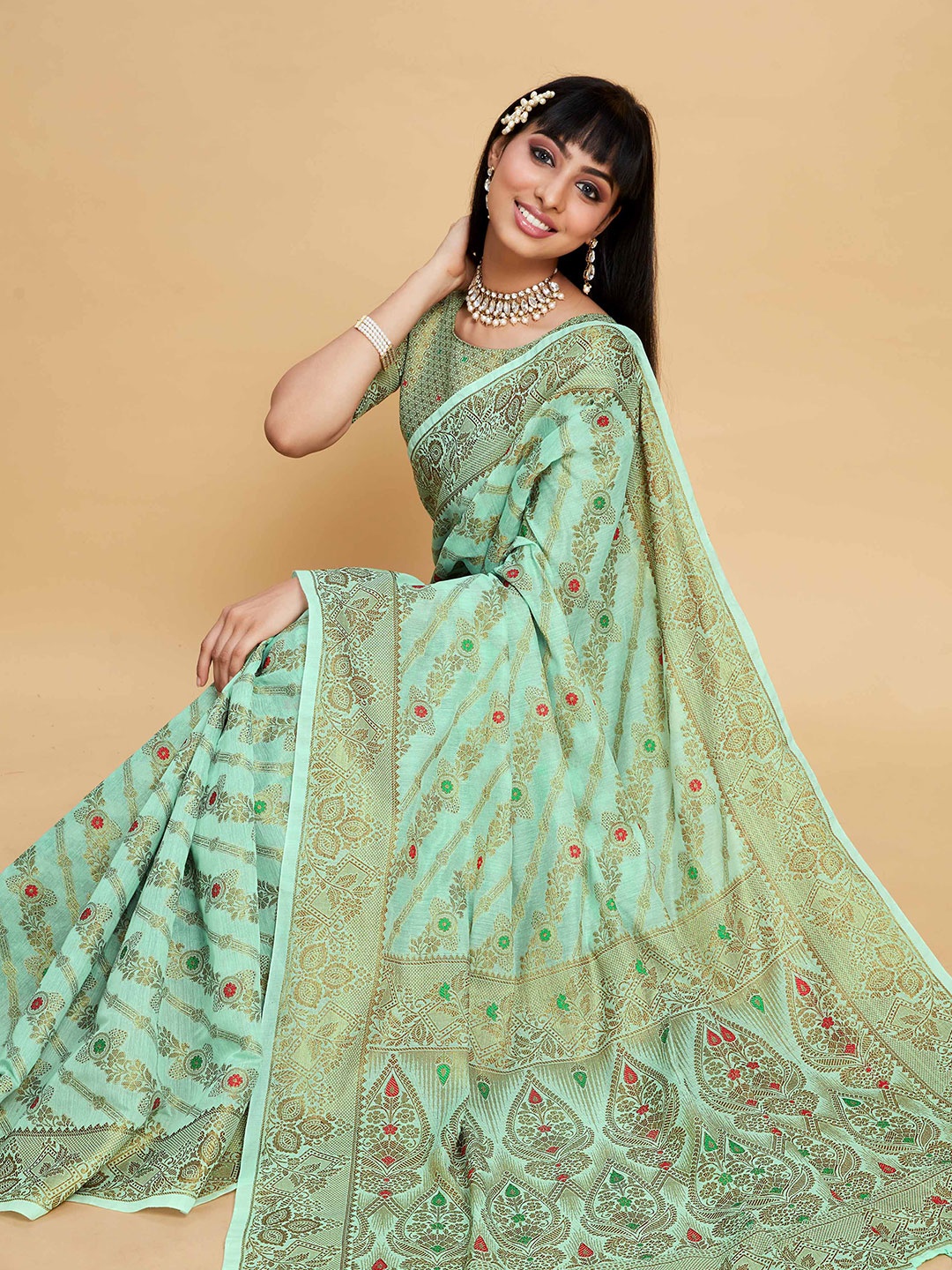 

Sangria Sea Green Ethnic Motifs Woven Design Zari Saree