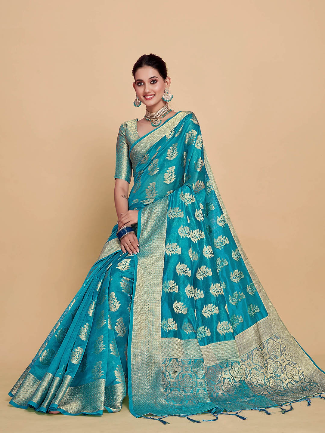 

Sangria Turquoise Blue Ethnic Motifs Woven Design Zari Organza Saree