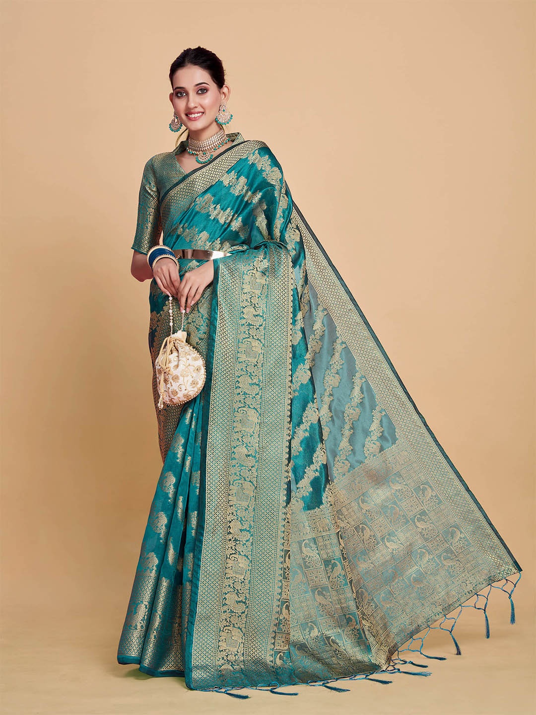 

Sangria Turquoise Blue Ethnic Motif Woven Design Zari Organza Saree