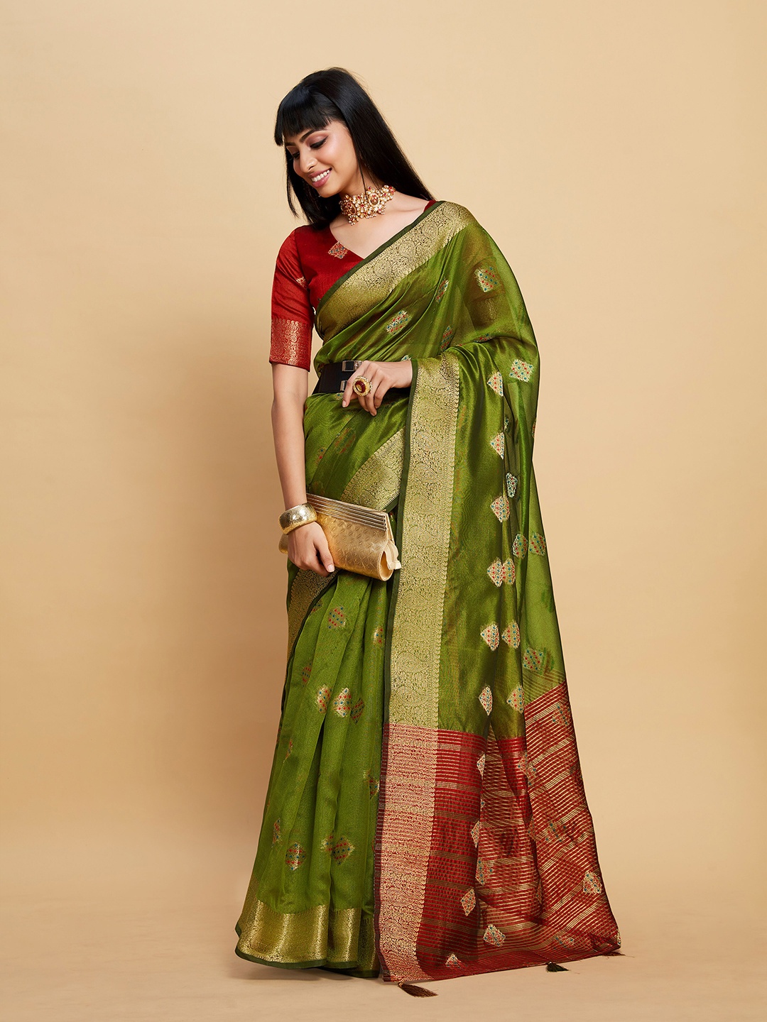 

Sangria Green Ethnic Motifs Woven Design Zari Organza Saree