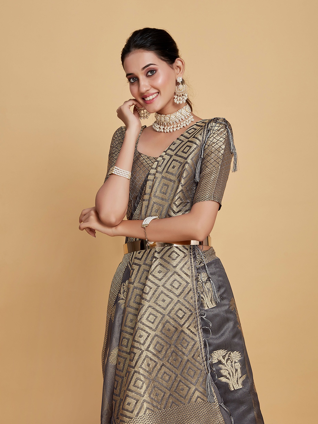 

Sangria Grey Floral Woven Design Zari Organza Saree