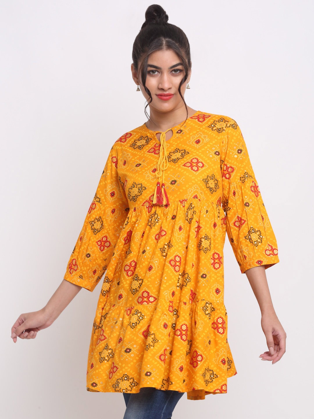 

KALINI Bandhani Printed Tie-Up Neck Embellished Cotton Tunic, Yellow
