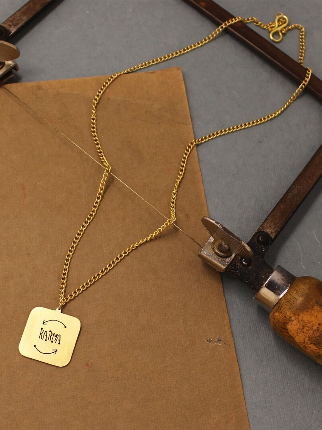 

Goldnera Gold-Plated Karma Design Pendant With Chain