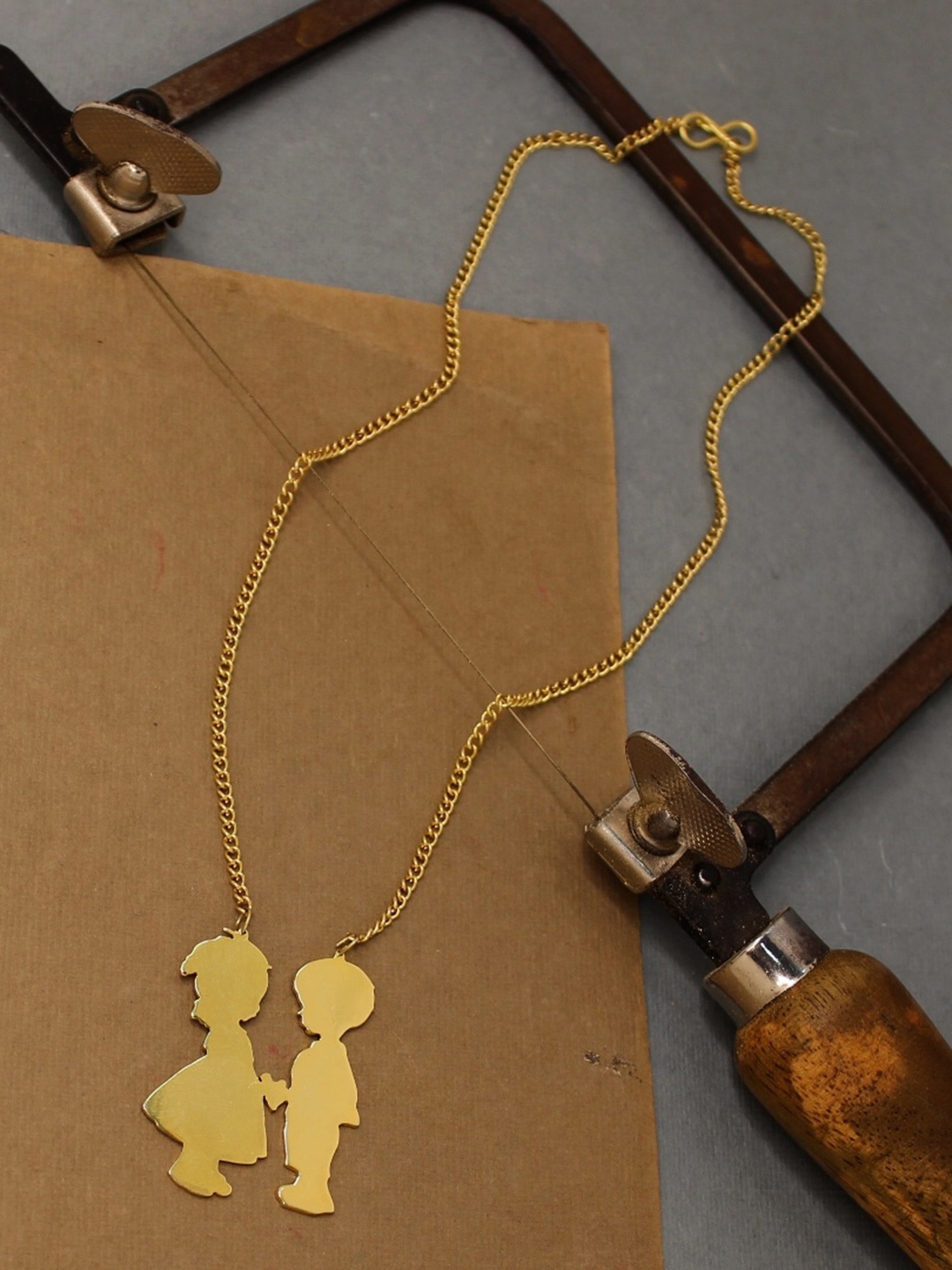 

Goldnera Gold-Plated Love Cute Bachpan ka Pyar Brass Pendant With Chain
