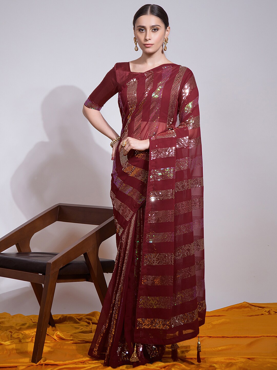 

Satrani Maroon Striped Sequinned Saree