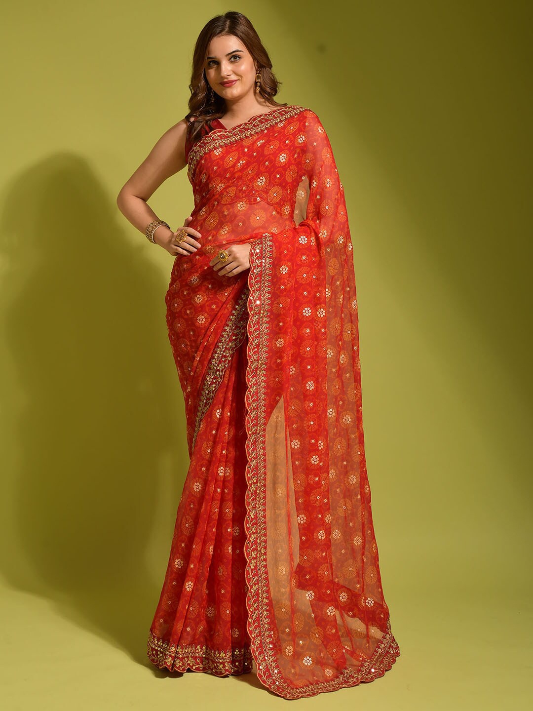 

Satrani Orange & Gold-Toned Bandhani Printed Saree