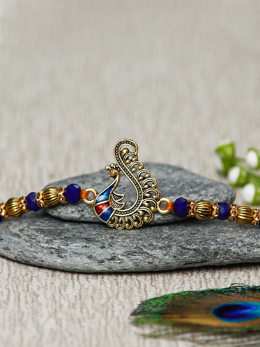 

eCraftIndia Peacock Charm & Beaded Rakhi, Yellow