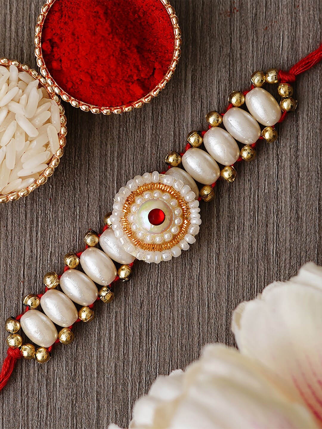 

eCraftIndia Pearls-Beaded Rakhi, Gold