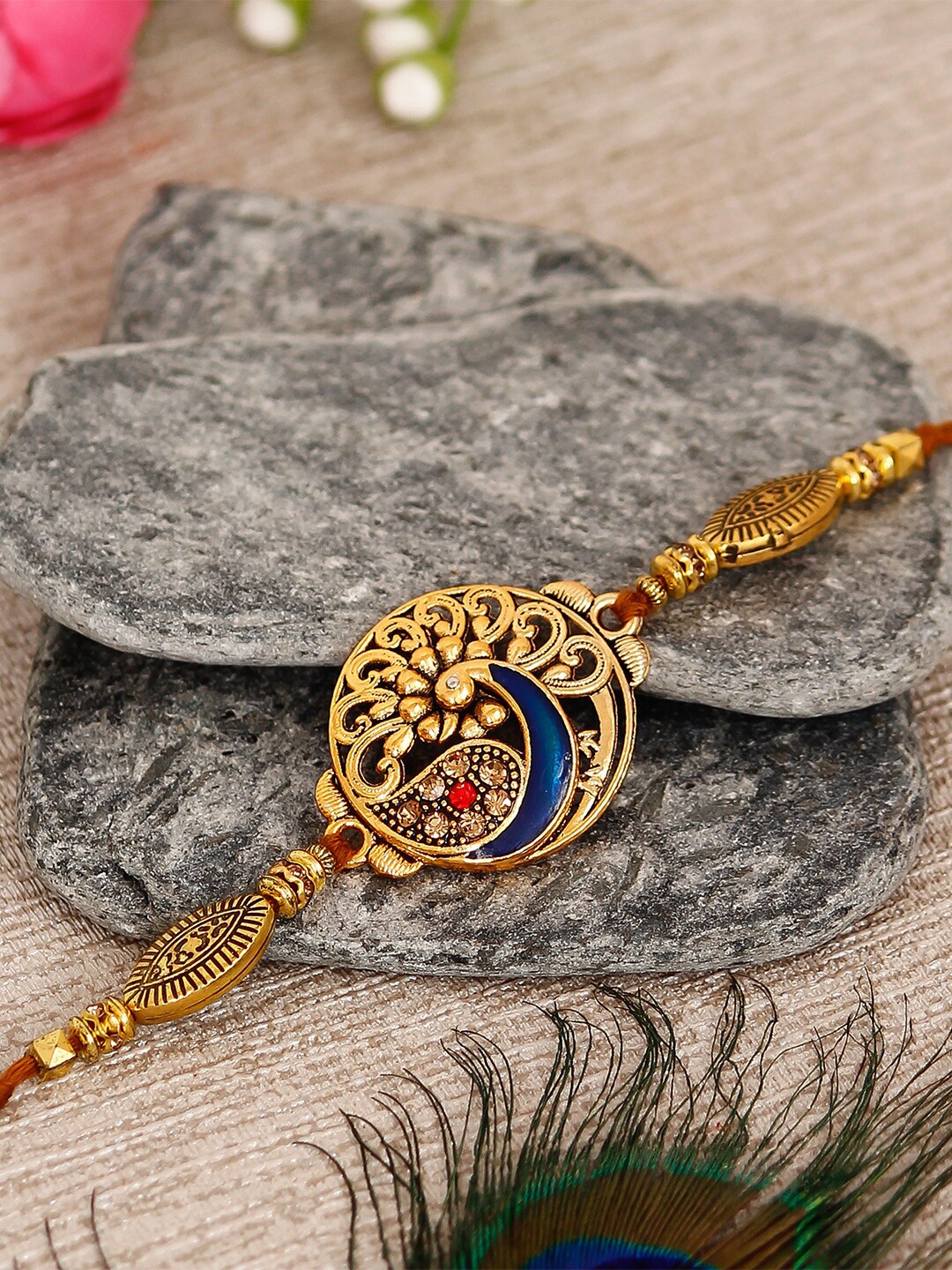 

eCraftIndia Stone-studded Designer Peacock Rakhi, Gold